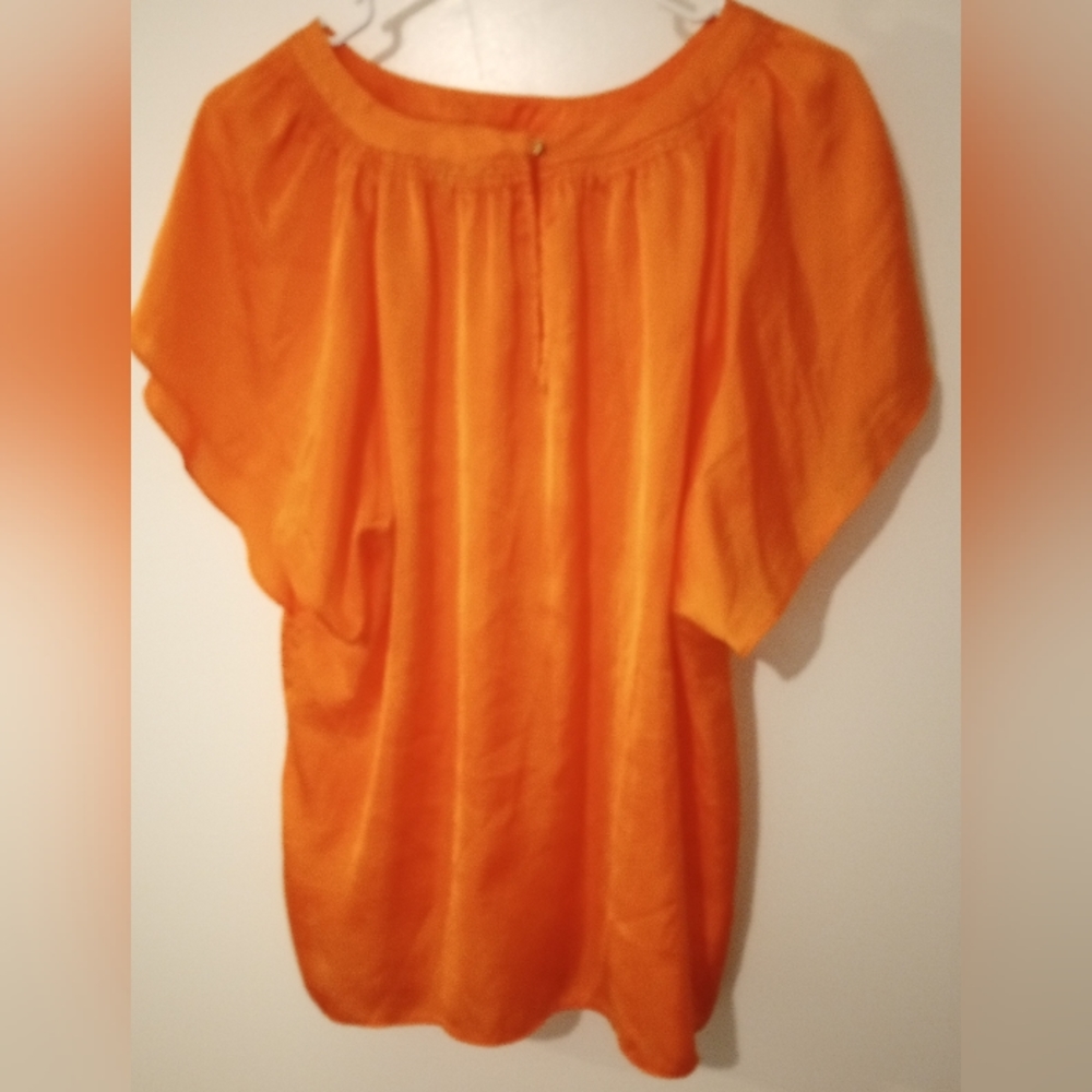 A neon orange Vince Camuto top size medium